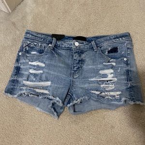 Buckle black jean shorts